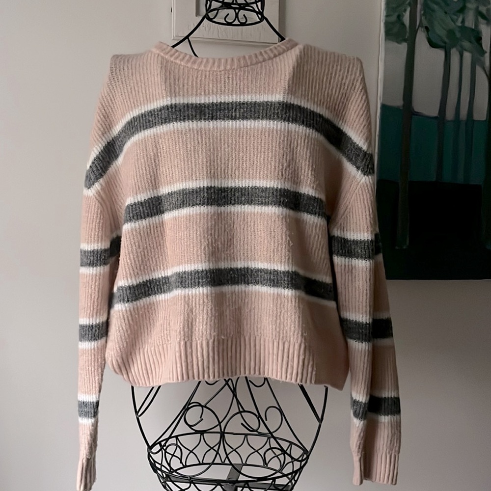 Cute, super soft pink striped sweater. No tag, fits like medium. Good condition
